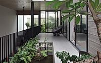 004-rach-gia-house-coastal-retreat-with-vertical-greenery.jpg