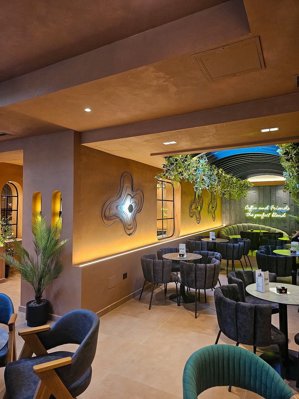 Warm-toned, modern cafe with curved furniture, arched windows, and nature-inspired decor.