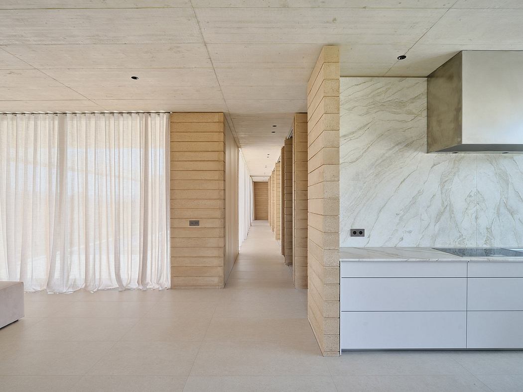 A minimalist architectural space with a corridor, wood paneled walls, and marble accents.
