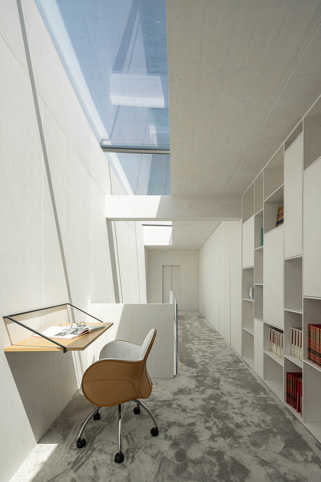A well-lit and spacious modern interior with clean architectural lines and minimalist design.