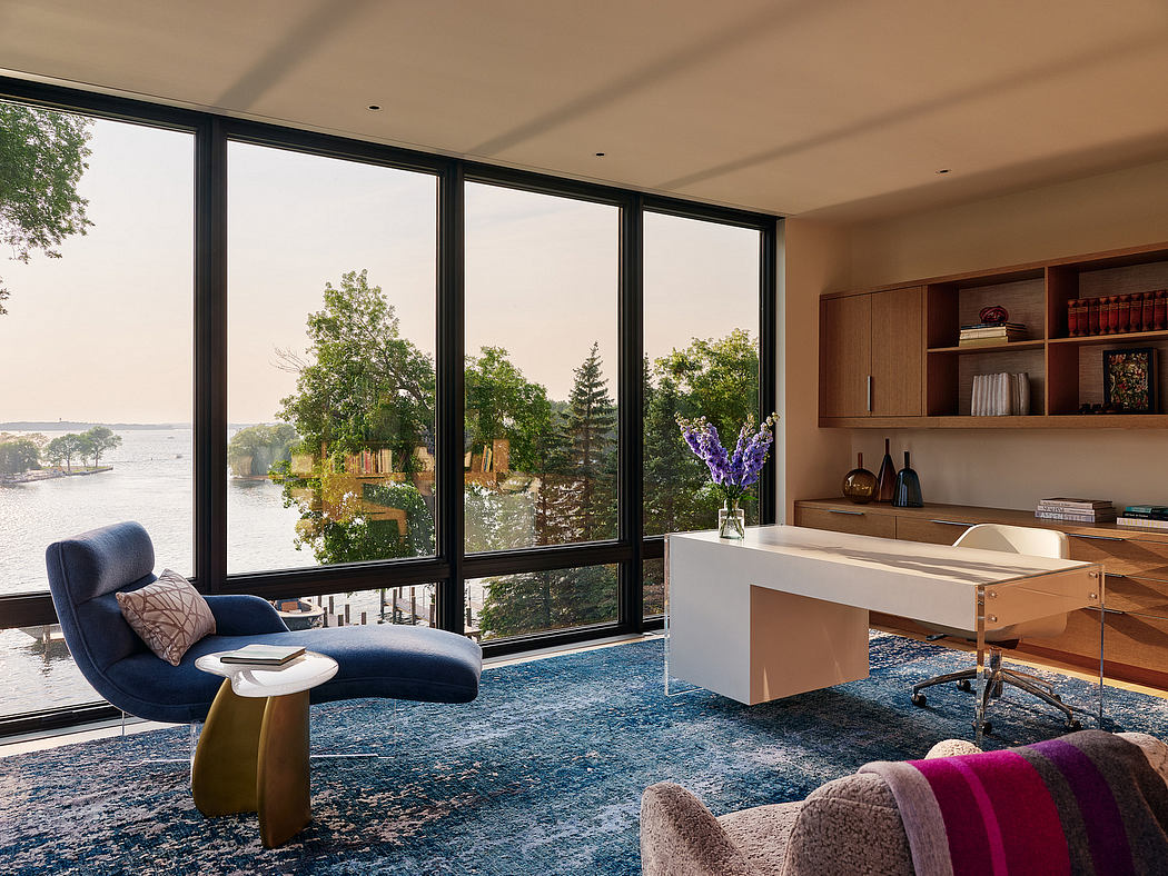 Spacious lakeside home with modern architecture, cozy furnishings, and picturesque views.