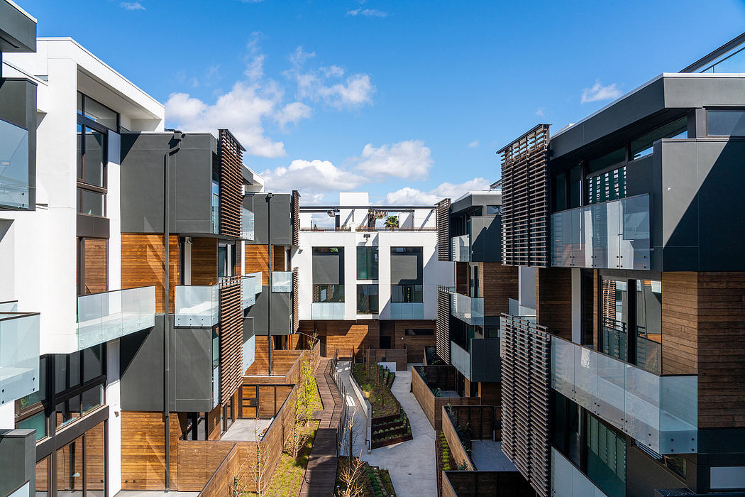 Striking modern architecture with wood and glass accents, diverse levels, and walkways.