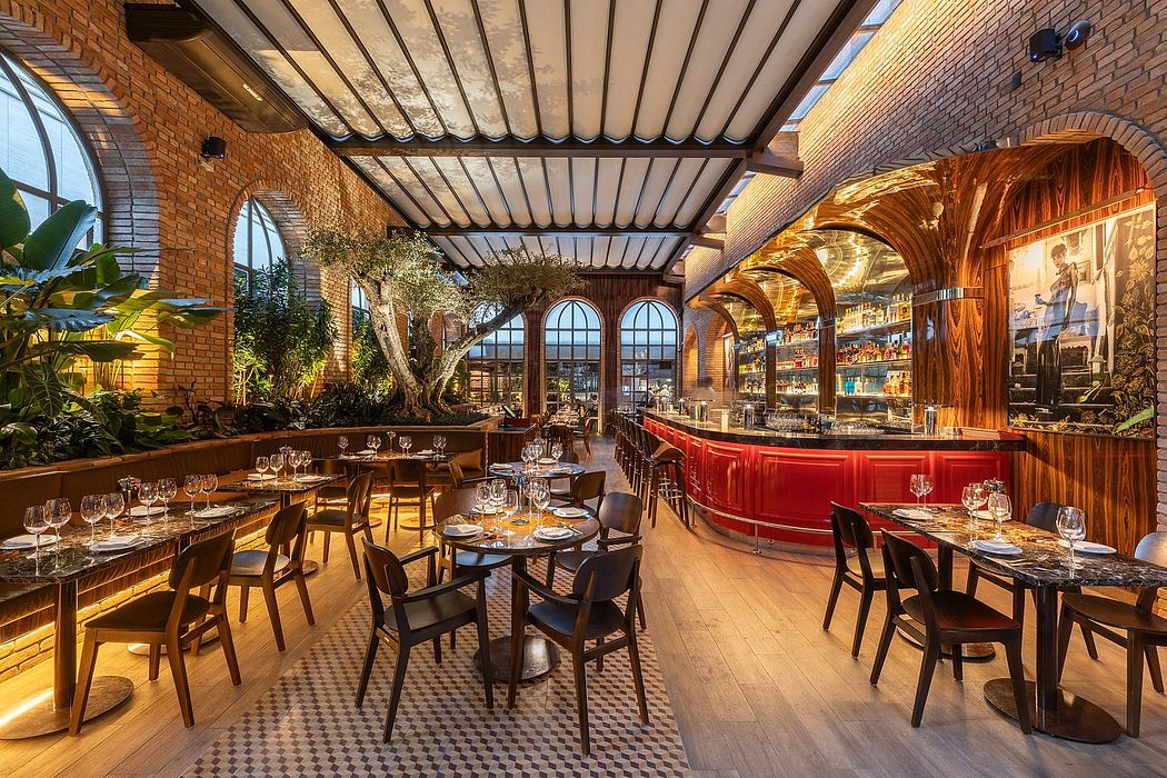 Inviting brick-and-wood interior with arched windows, warm lighting, and a curved red bar.