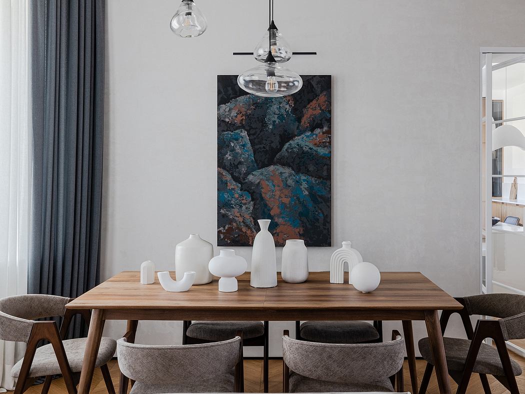 Elegant dining room with wooden table, modern lighting, and abstract artwork.
