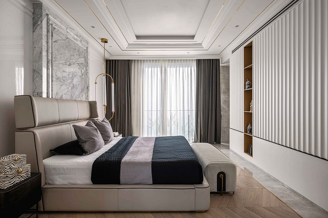 Elegant bedroom with intricate ceiling moldings, plush bedding, and a large window.