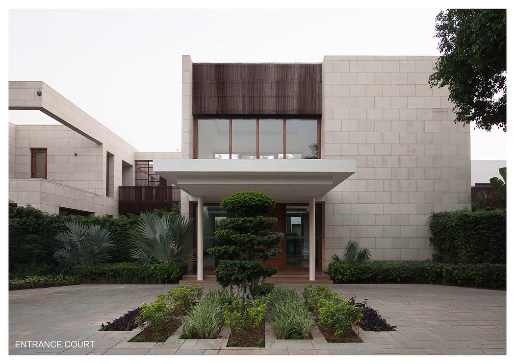 Striking modern architecture with clean lines, geometric forms, and lush landscaping.