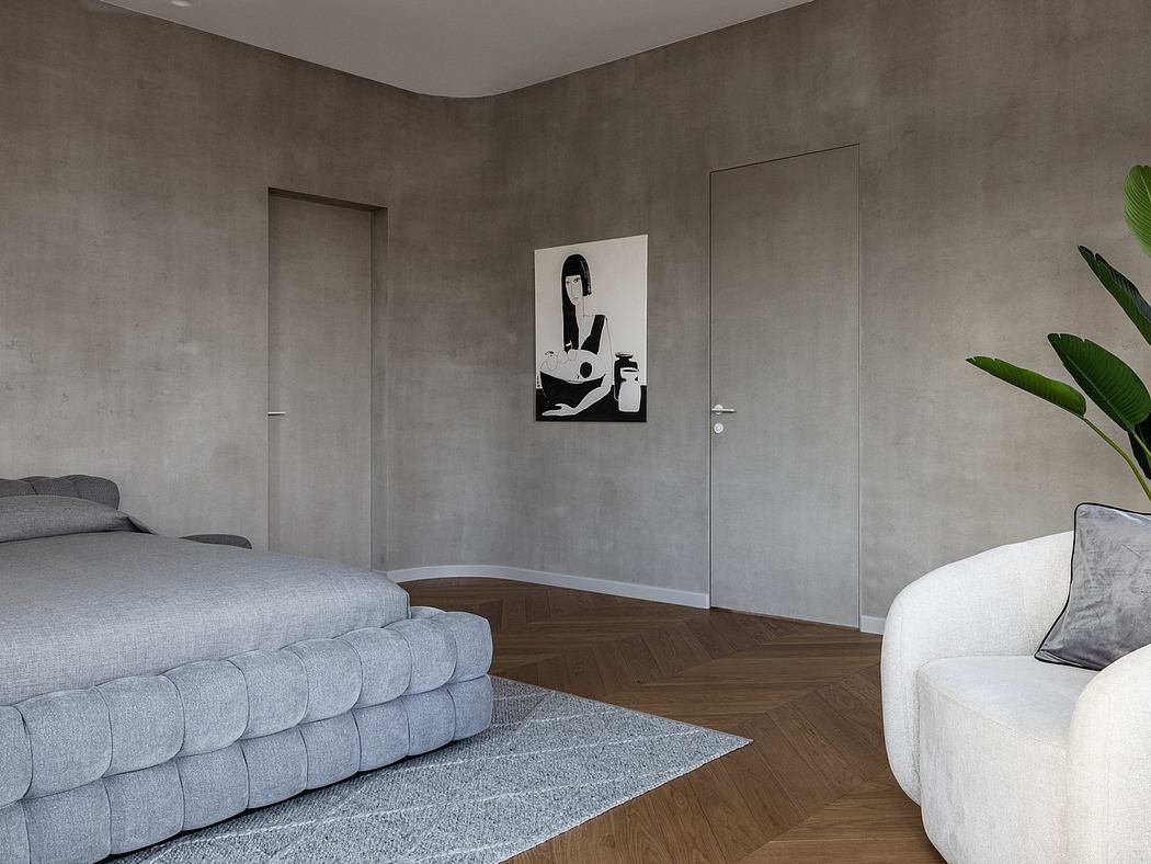 A minimalist bedroom with concrete walls, a sleek gray sofa, and a modern artwork.