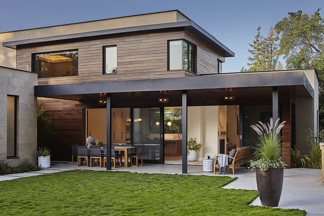 scalloped shingles and timber screens wrap modern austrian home by MWarchitekten