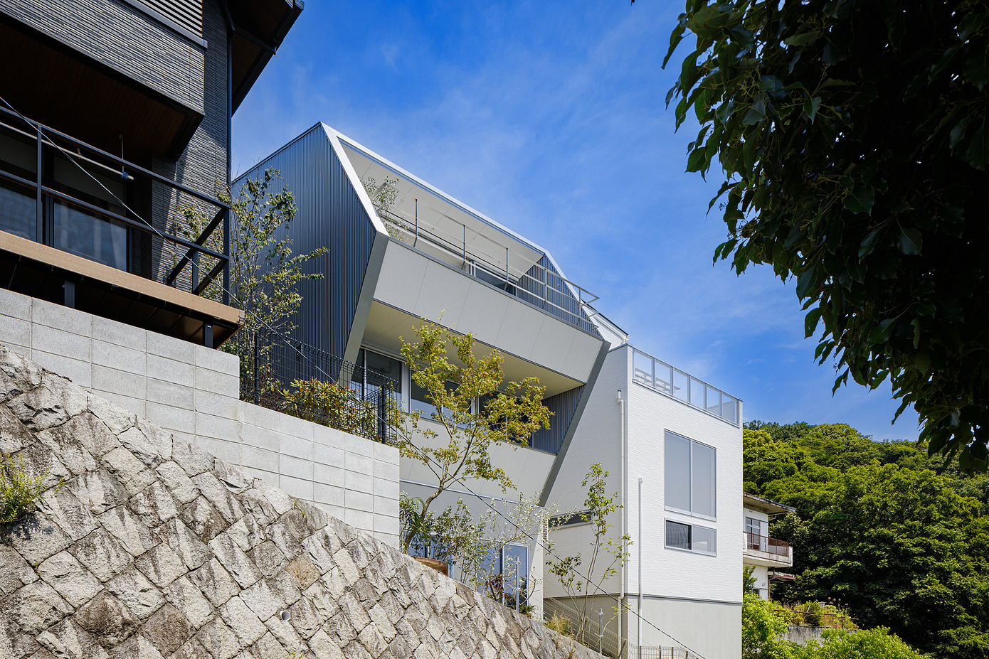 Wedge House by Syncstudio Offers Mountain Views in Ikeda City