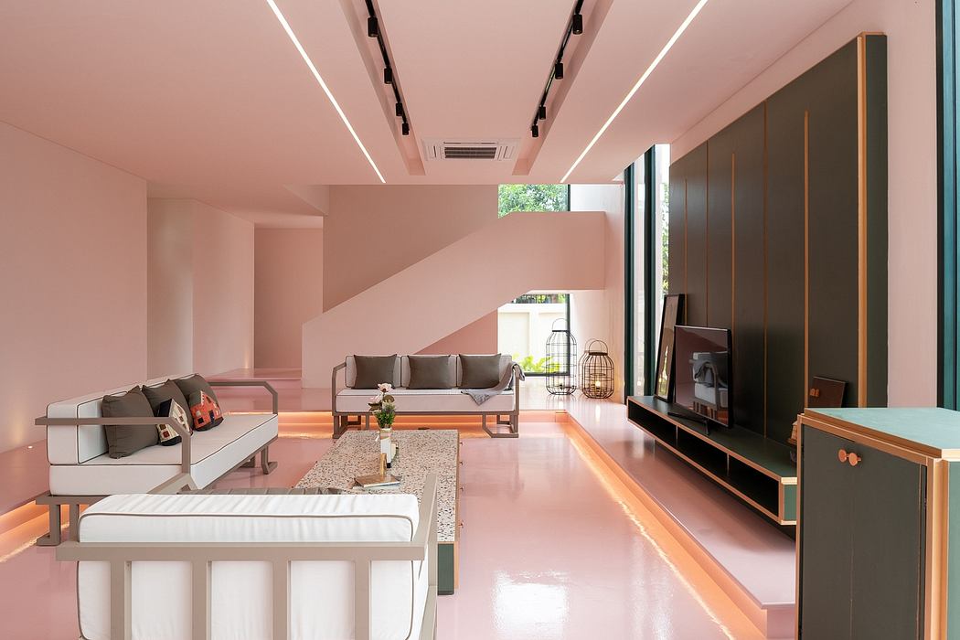 Spacious living room with modern furniture, sleek lighting, and expansive windows.