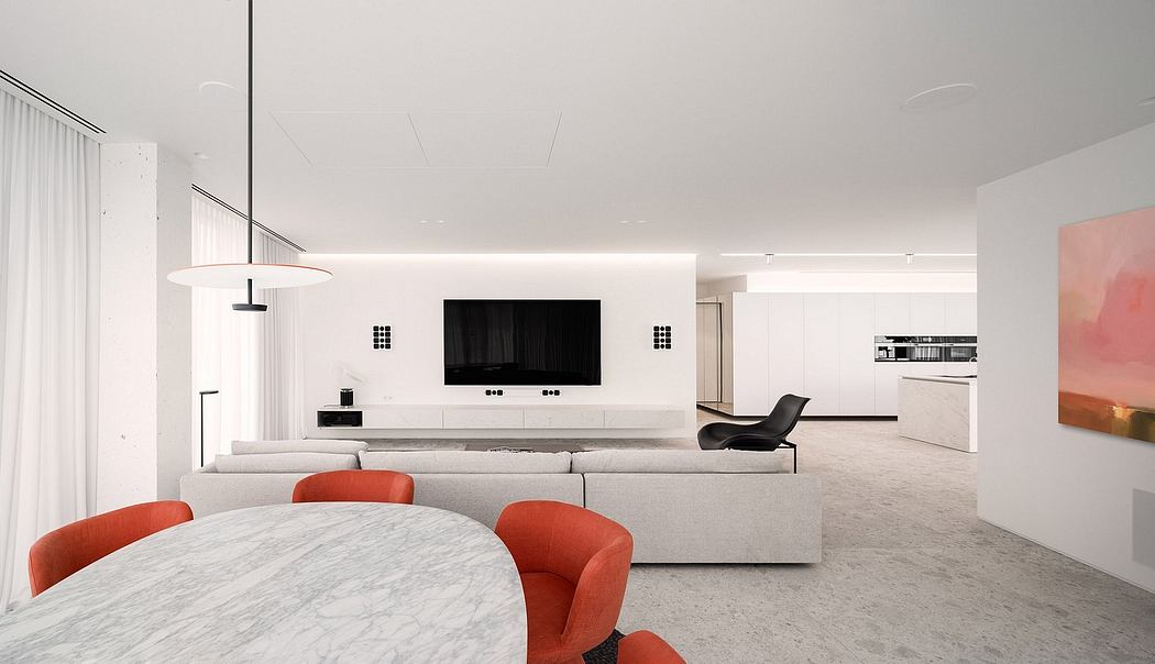 Minimalist living room with sleek furniture, marble table, and recessed wall-mounted TV.