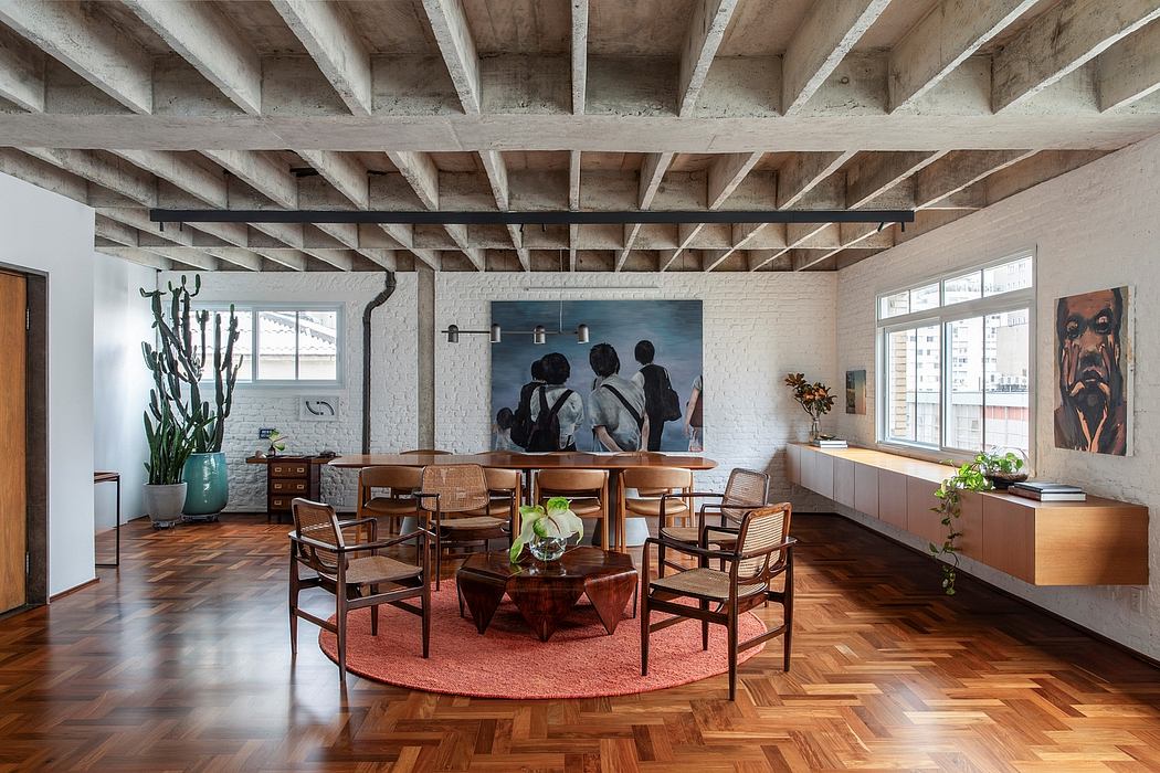 An eclectic dining room with exposed wooden beams, brick walls, and a mix of vintage and modern furnishings.
