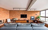 002-orlandini-apartment-features-textured-warm-interiors-and-versatility.jpg