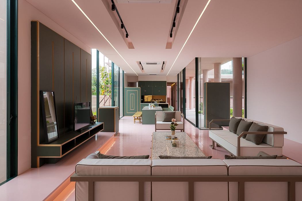 Spacious open-plan living area with modern design elements, bold color palette, and abundant natural light.