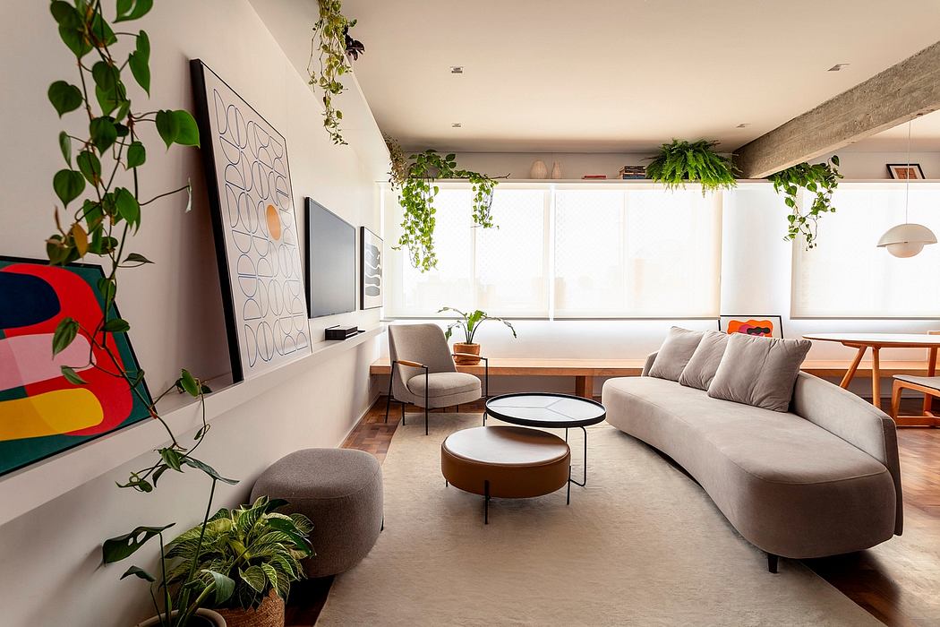 A modern, plant-filled living room with a minimalist, colorful design aesthetic.