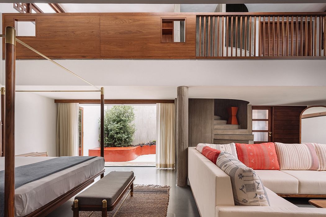 Spacious open-concept living area with warm wood accents, modern furniture, and large windows.