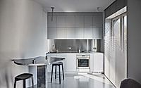 003-i-t-small-apartment-highlights-artistic-expression-and-functionality.jpg