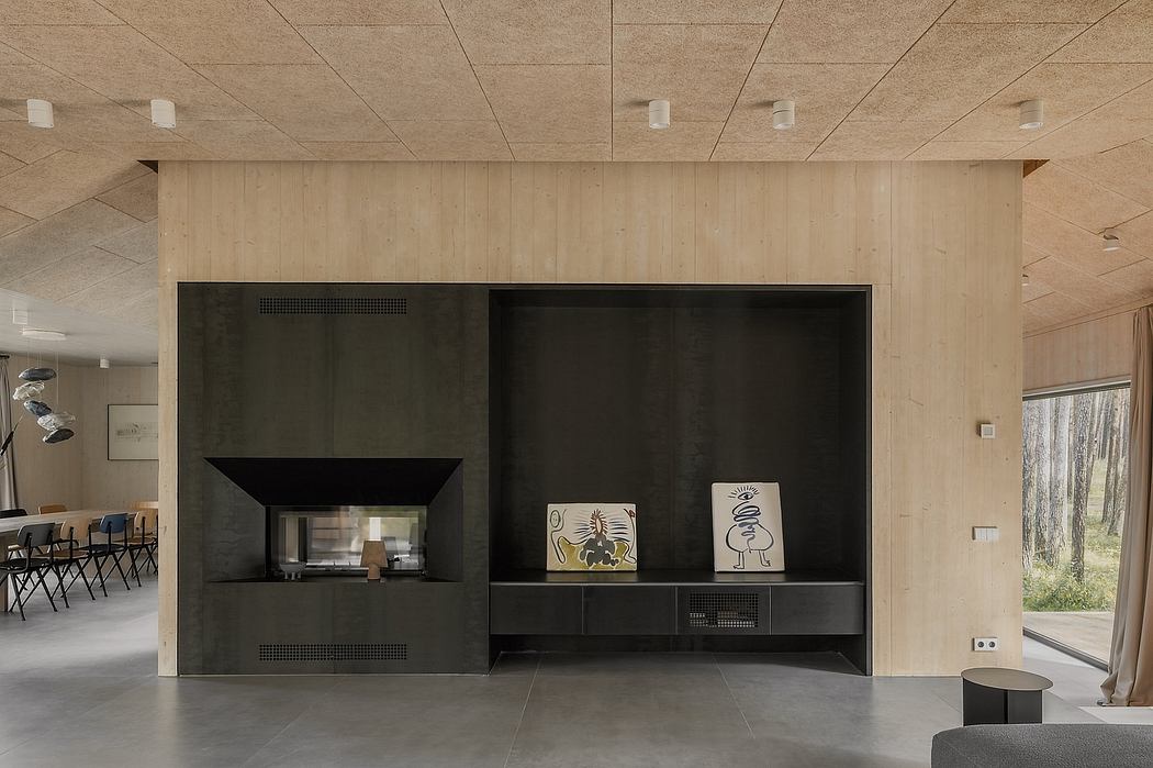 The image showcases a modern, minimalist interior design with a prominent fireplace surrounded by wooden paneling and built-in shelves.