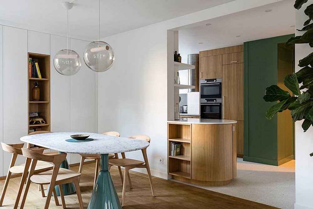 Spacious, modern kitchen and dining area with sleek design elements and natural materials.