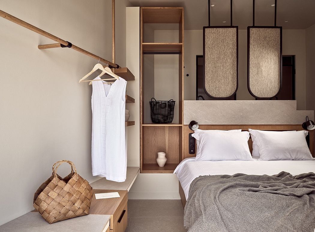 A minimalist bedroom with a wood-paneled wall, built-in shelving, and a white linen dress.