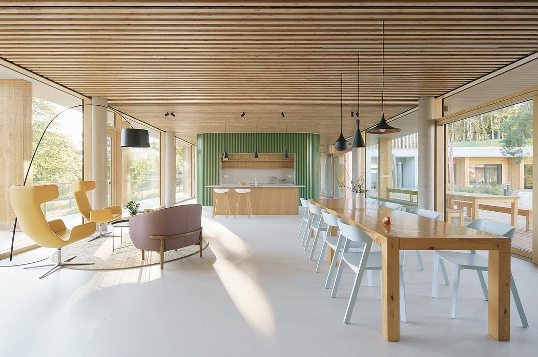 Modern open-plan interior with wood panels, minimalist furniture, and natural lighting.