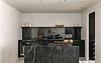 005-cinza-apartment-features-brazilian-marble-accents.jpg