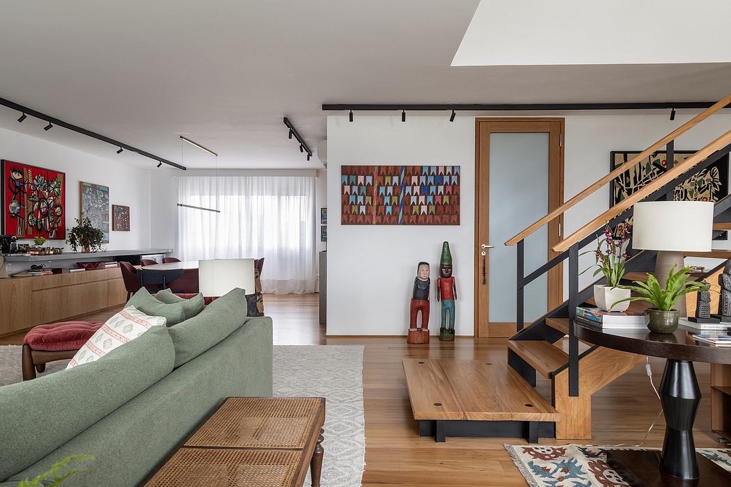 Vibrant, eclectic interior with modern furnishings, artwork, and architectural details.