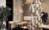 005-uruk-restaurant-interior-evokes-eastern-ambiance-with-minimalist-decor.jpg