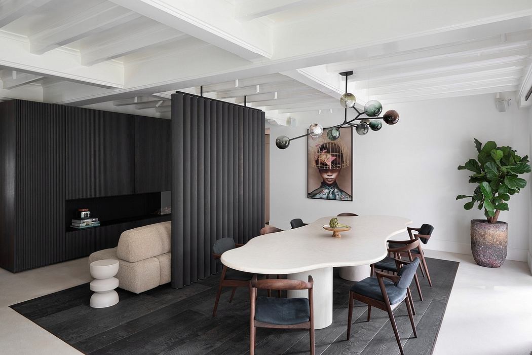 Elegant open-concept living area with modern furnishings, lighting fixtures, and partition wall.