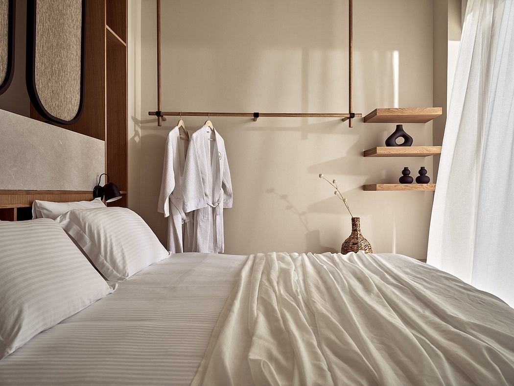 Cozy bedroom with wooden shelving, plush bedding, and minimalist decor creates a serene ambiance.