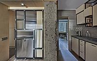 006-almaty-plywood-apartment-divides-public-and-private-spaces.jpg