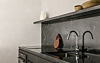 006-cinza-apartment-features-brazilian-marble-accents.jpg