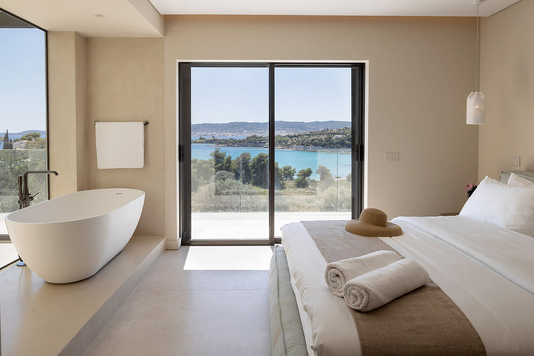 Spacious bedroom with panoramic lake view, minimalist design and large windows.