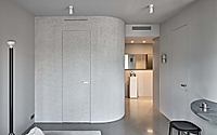 006-i-t-small-apartment-highlights-artistic-expression-and-functionality.jpg