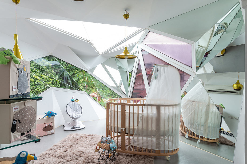 Striking geometric architecture with playful modern nursery decor and lush outdoor views.