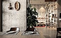 006-uruk-restaurant-interior-evokes-eastern-ambiance-with-minimalist-decor.jpg