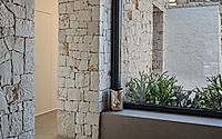 007-villa-d-by-fos-architetti-encases-italian-house-extension-in-dry-stone-wall.jpg