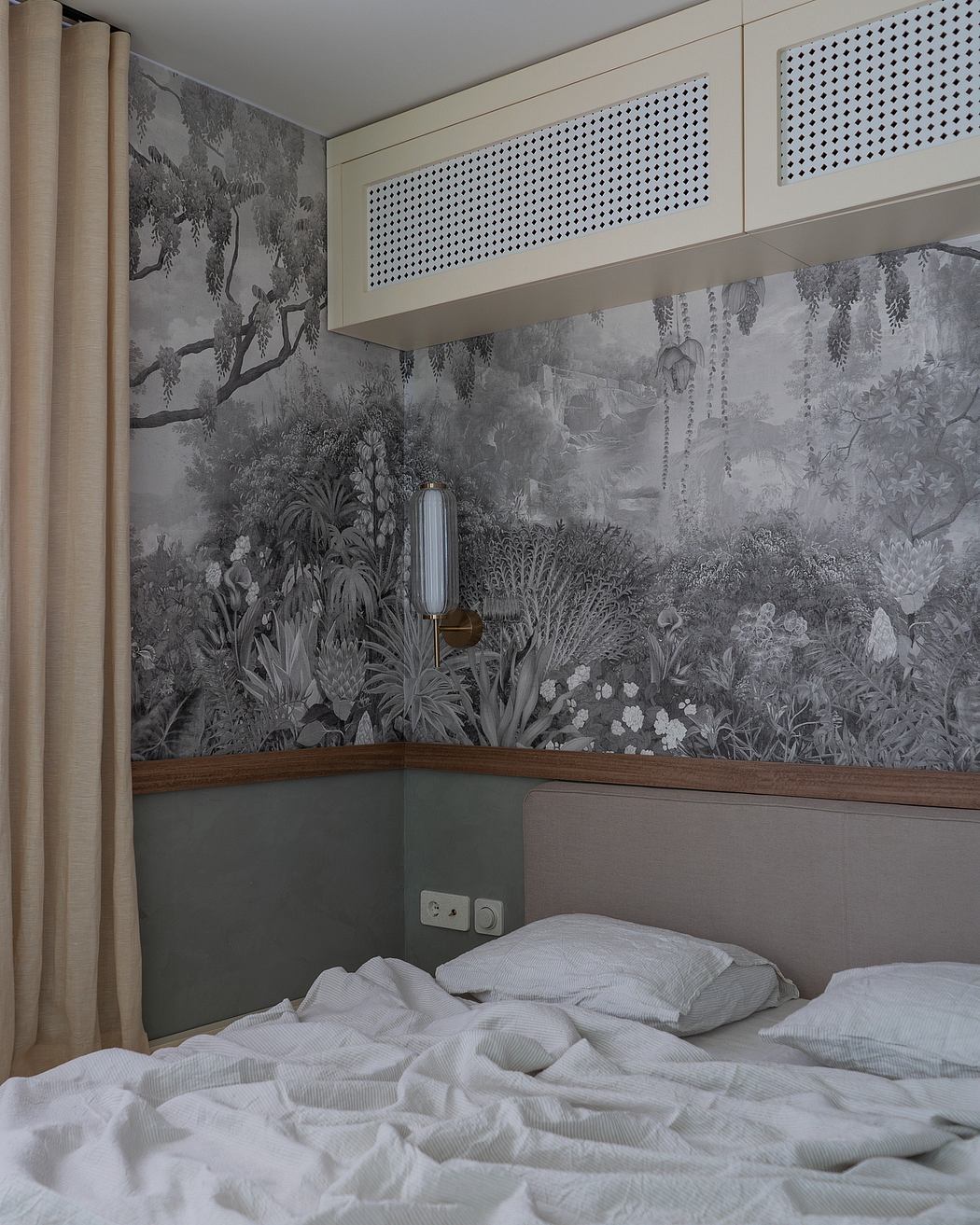 Serene bedroom with modern wall mural and minimalist cabinetry, creating a cozy atmosphere.