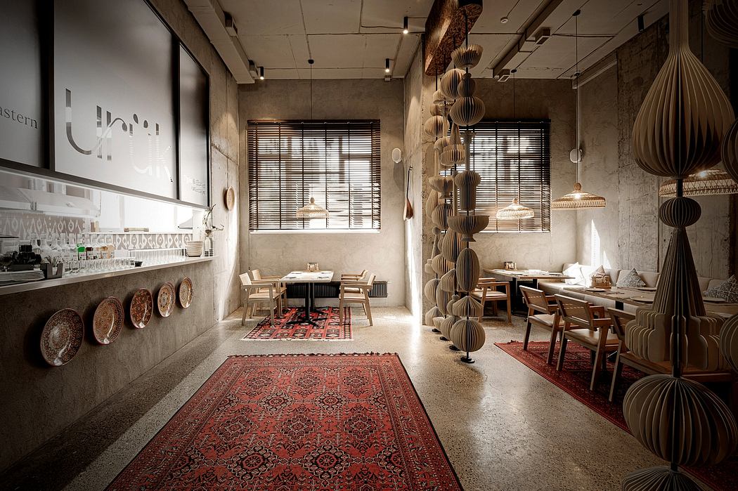 A cozy, rustic-chic cafe with wooden furnishings, patterned rugs, and eye-catching pendant lights.