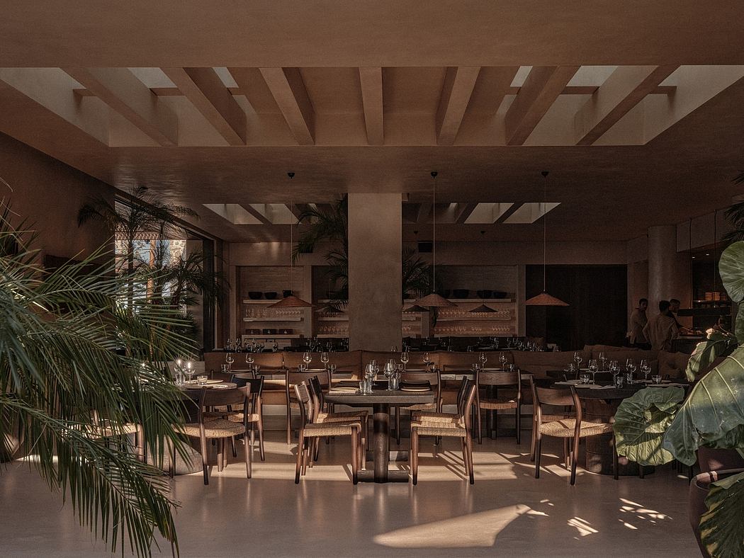 Warm, rustic dining space with wooden beams, lush plants, and a cozy, inviting atmosphere.