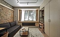 014-almaty-plywood-apartment-divides-public-and-private-spaces.jpg