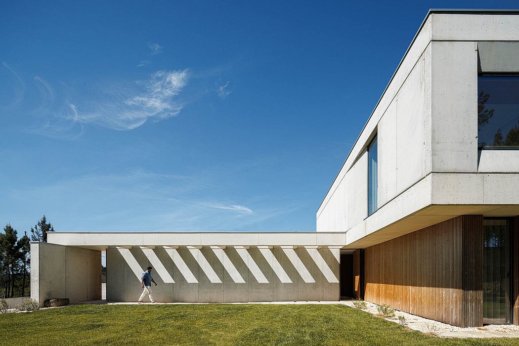 Sleek, modern architecture with clean lines, wooden accents, and a covered walkway.