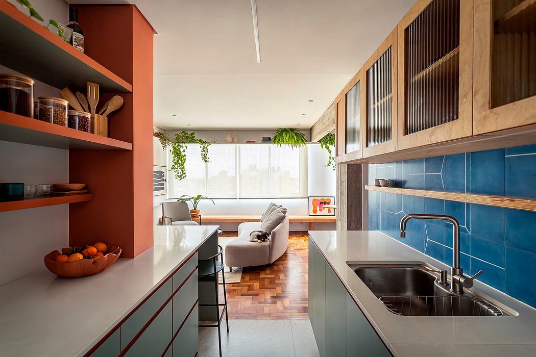 A modern kitchen with vibrant colors, sleek cabinets, and a cozy seating area.