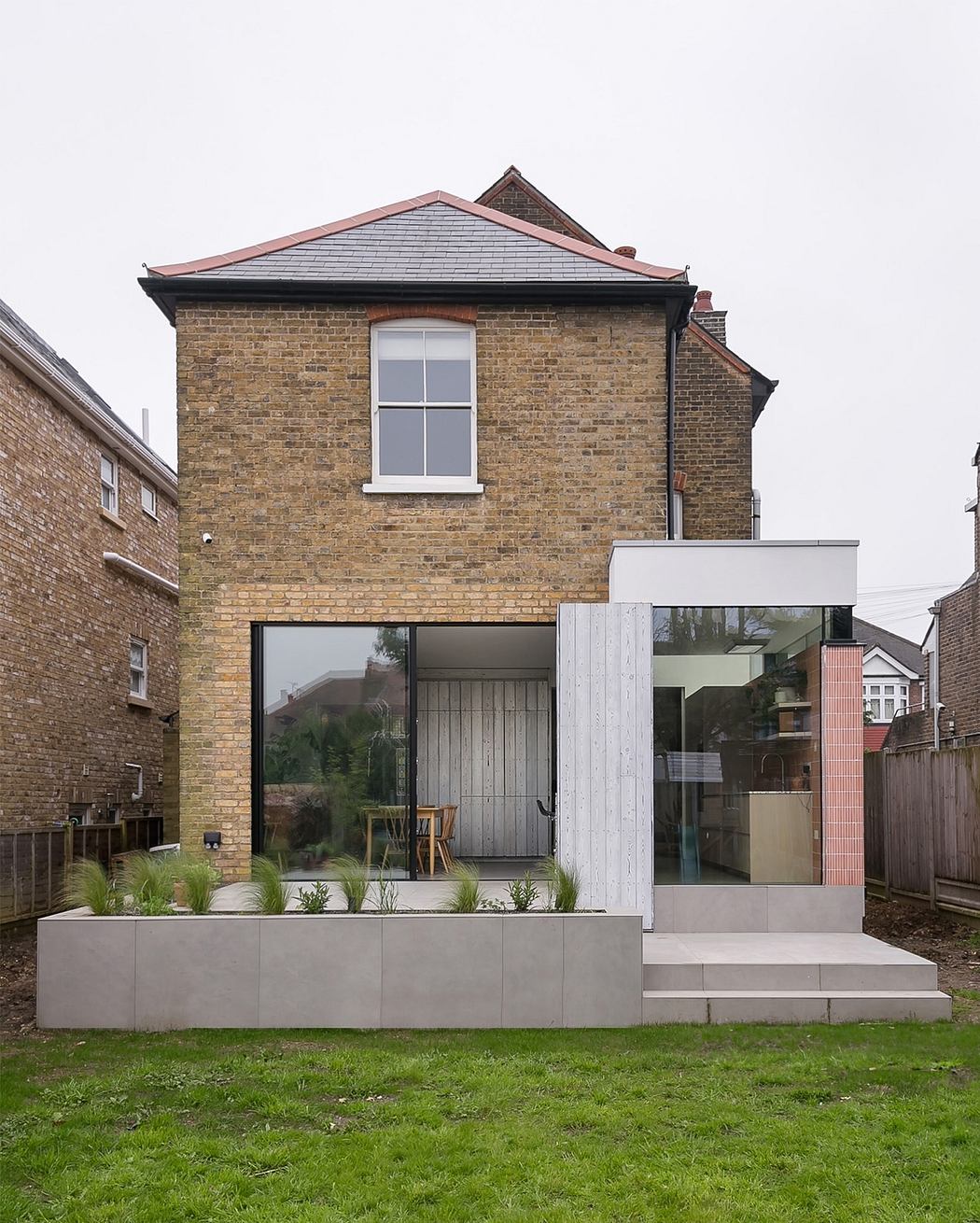 House 2-8-8 Embraces Grey Timber and Terracotta Tiles