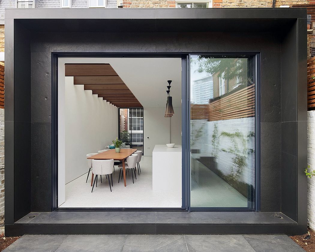 The Finned Extension Reconfigures London Home for Family Living