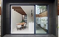 001-the-finned-extension-reconfigures-london-home-for-family-living.jpg