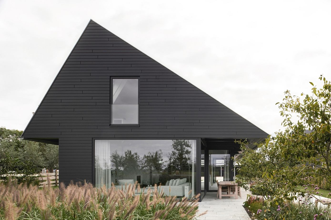 Villa Ruwiel’s Asymmetrical Roof Echoes Traditional Dutch Barns