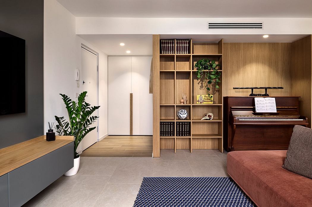 Minimalist living room with built-in wooden shelving, potted plant, and upright piano.