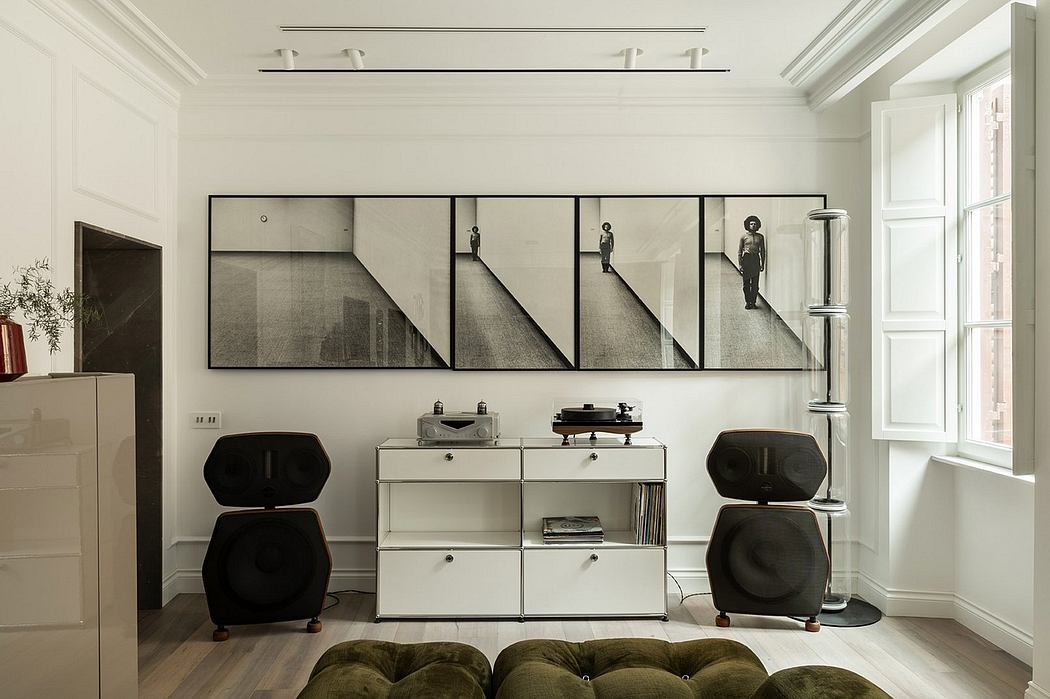 A minimalist living room with sleek furniture, black-and-white artwork, and a serene ambiance.