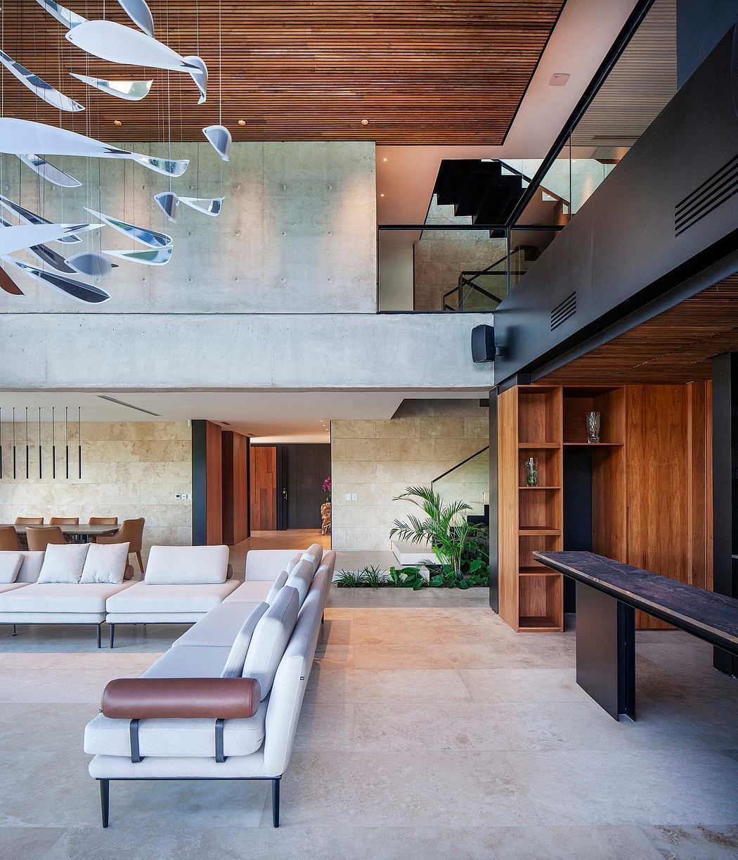 Sleek minimalist interior with concrete walls, wood ceiling, and modern furniture.